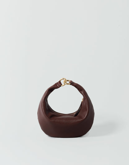 HYER GOODS Micro Ring Hobo Bag in Bordeaux with rounded shape and adjustable strap, showcasing textured leather and minimalist design.