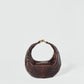 Dark brown python leather hobo bag from HYER GOODS, The Micro Ring Bag with a sleek, compact design and textured finish.