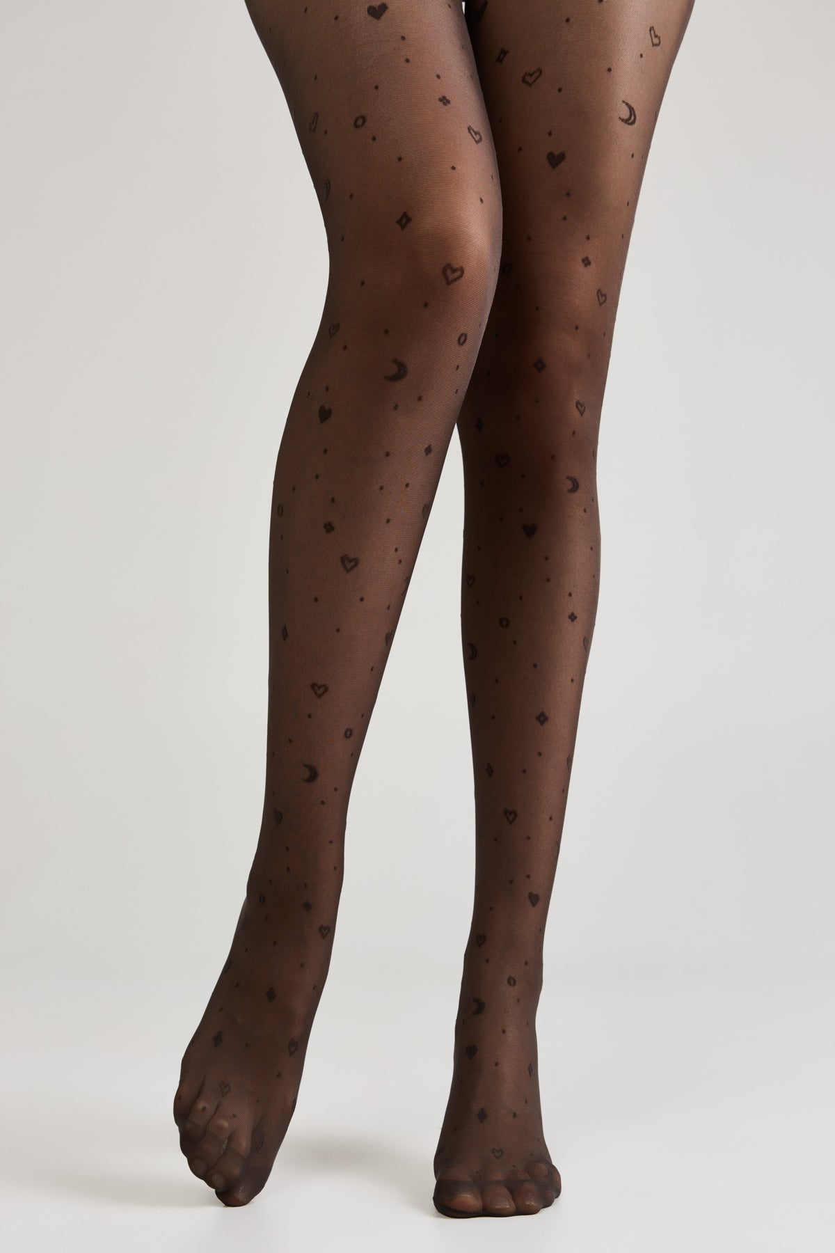 Women's fantasy tights with moon patterns in graphite, featuring celestial moon designs for a stylish, whimsical look.