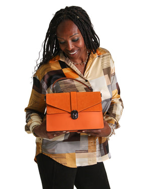 Orange Nancy large handbag by Germán Fuentes featuring stylish design, spacious interior, and elegant handles.