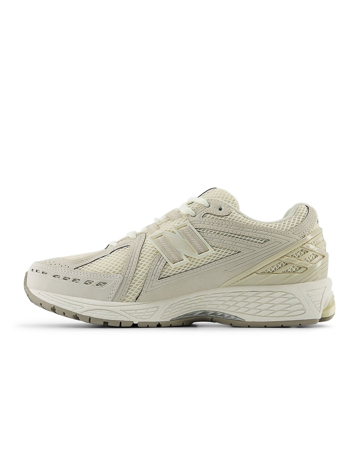 Beige New Balance 1906 men's sneakers with layered mesh and metallic accents
