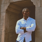 Men's long sleeve button-down polo shirt in white with navy contrast from Twillory, featuring a classic collar and button front.