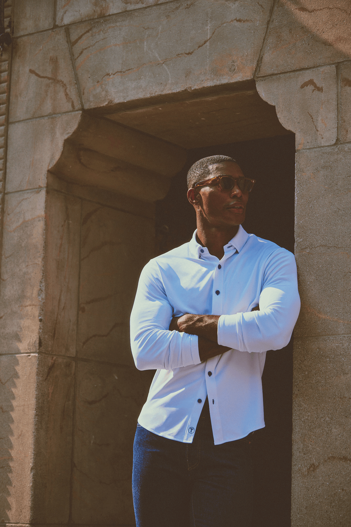 Men's long sleeve button-down polo shirt in white with navy contrast from Twillory, featuring a classic collar and button front.