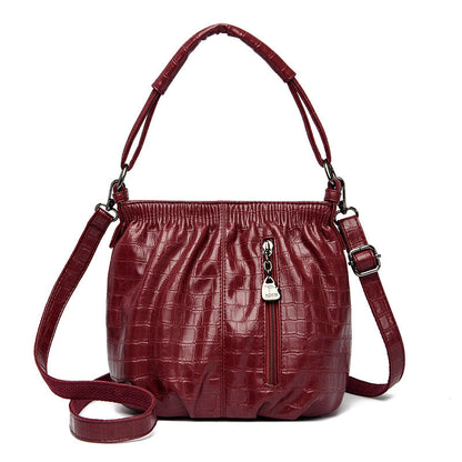 Women's Rirati slouchy elegant fashion shoulder pouch bag with a relaxed, stylish design and soft texture.