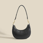 Rirati retro underarm textured light luxury crescent moon shoulder bag with stylish design and textured finish.