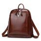 Women's leather vintage cowhide backpack by Rirati featuring oil wax finish and stylish design.