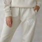 Our World Needs Jesus Beige Unisex Sweatpant