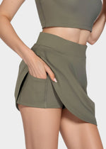 Trophy Yoga built-in pocket tennis skort with athletic design, made in the USA, featuring a comfortable fit and functional pocket.