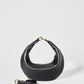 The Piccola Ring Bag