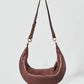 HYER GOODS Piccola Ring Bag hobo bag in Bordeaux color with circular handle and compact design.