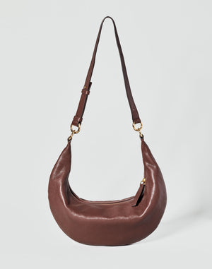 HYER GOODS Piccola Ring Bag hobo bag in Bordeaux color with circular handle and compact design.