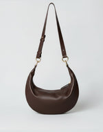 Hyer Goods Piccola Ring Bag in dark chocolate and nappa leather, stylish hobo bag with ring handle detail.