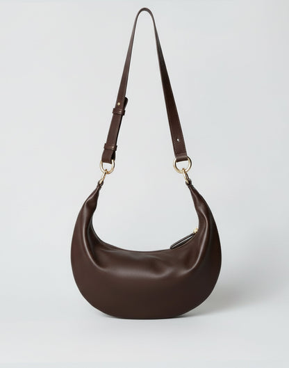 Hyer Goods Piccola Ring Bag in dark chocolate and nappa leather, stylish hobo bag with ring handle detail.