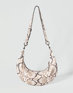 HYER GOODS Piccola Ring Bag hobo bag in Python leather with a round ring handle and compact design.