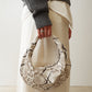 The Piccola Ring Bag
