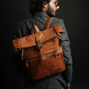 Classy Leather Bags Ortiz Rucksack backpack with adjustable straps and top handle, made of brown leather for everyday use.