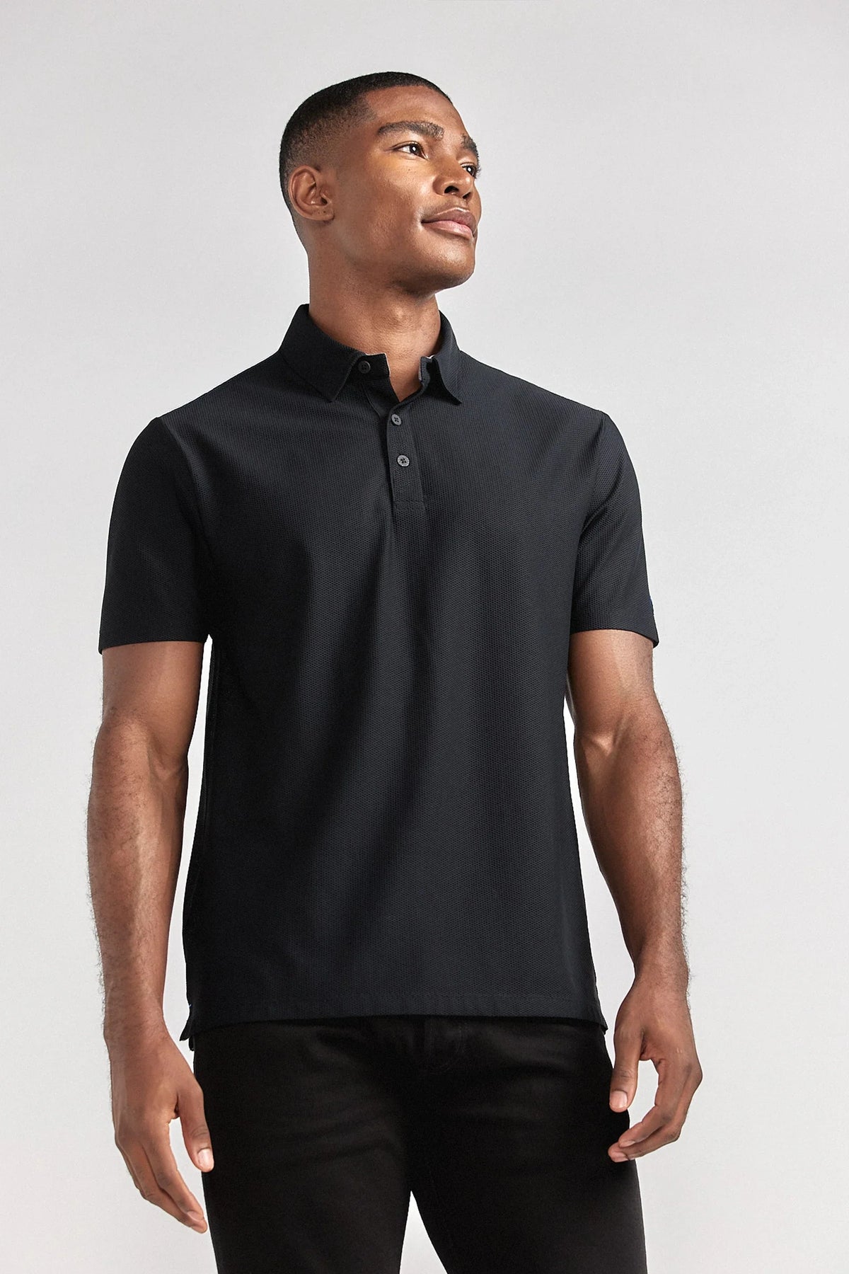 Black AIR 3 Button Polo from Twillory, casual men's shirt with a classic collar and three-button placket, front view.