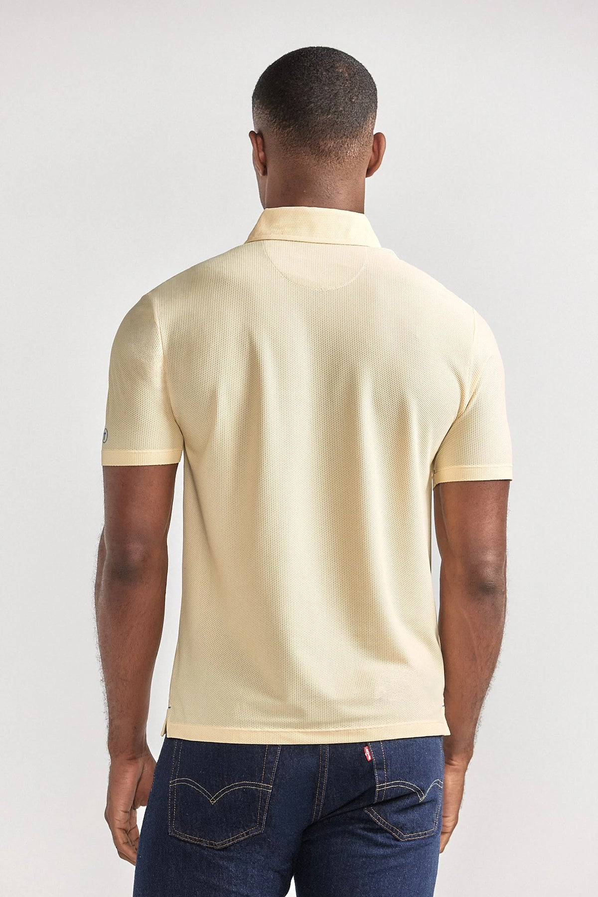 Yellow AIR 3 Button Polo from Twillory, casual shirt with a back view showing the classic collar and button details.