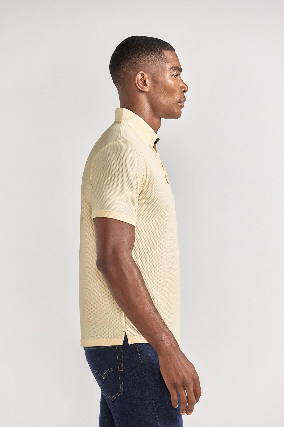 Yellow AIR 3 Button Polo by Twillory, casual solid shirt with a classic collar and side view showing the fit and fabric details.