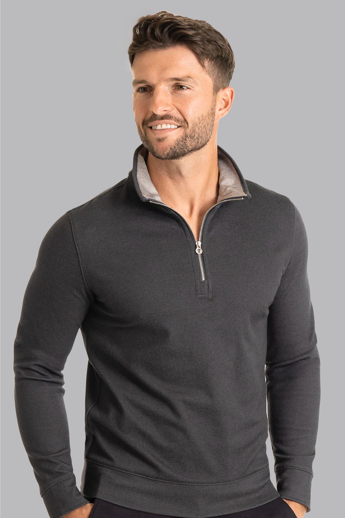 Twillory charcoal performance quarter zip shirt with front view, featuring a sleek collar and zipper closure for a modern look