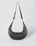 Black HYER GOODS Ring Bag hobo bag with gold ring detail, stylish and versatile accessory with a spacious interior.