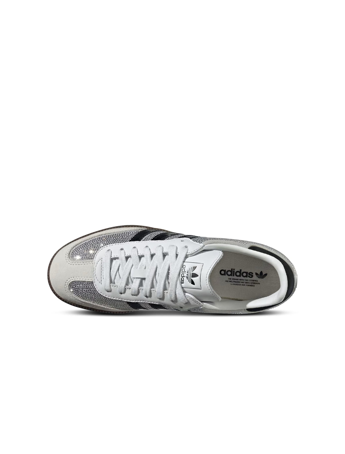 White Adidas Women's Samba OG sneakers with rhinestone accents, showcasing classic footwear style and clean design.
