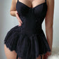 Black lace skirted babydoll set featuring delicate lace details and adjustable straps, designed for intimate wear.