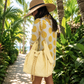 BEACH HAUS Bayshore Bucket Bag Medium in butter yellow with a structured bucket silhouette and drawstring closure