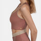 Trophy Yoga contrast cropped sports bra, Made in USA, featuring color-blocked panels and supportive racerback design