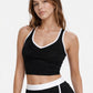 Trophy Yoga contrast cropped sports bra, made in USA, front view with color-blocked design
