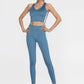 Trophy Yoga side split crop top in blue with four-way stretch fabric, made in USA