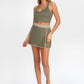 Trophy Yoga built-in shorts golf skirt, made in USA, shown in a sporty flat-lay view