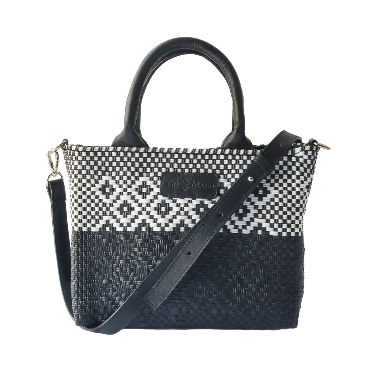 Black small woven crossbody bag by Tin Marin Brand, featuring textured fabric and a compact design for everyday use.