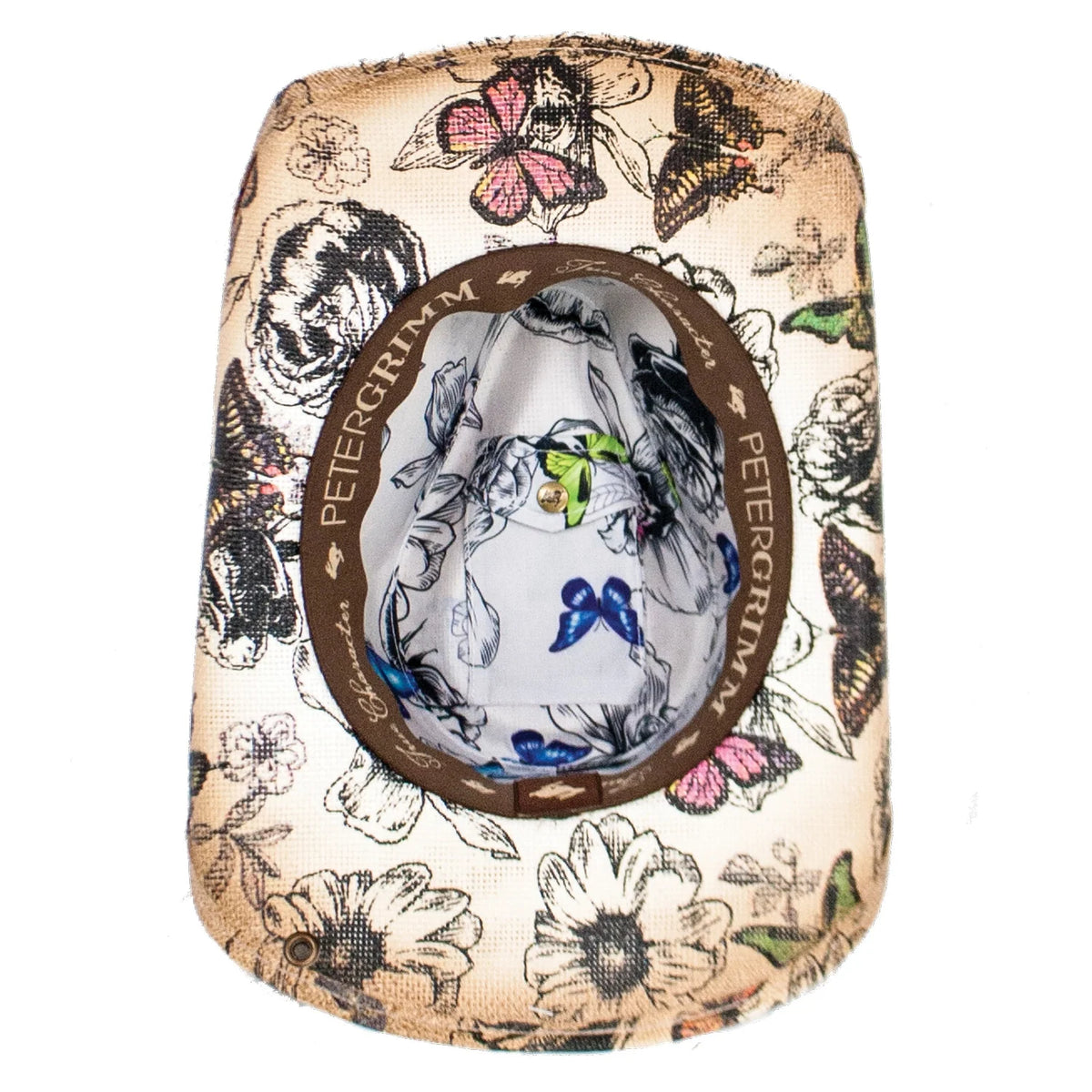 Peter Grimm Trace straw printed cowboy hat in tan with a curved brim and decorative band