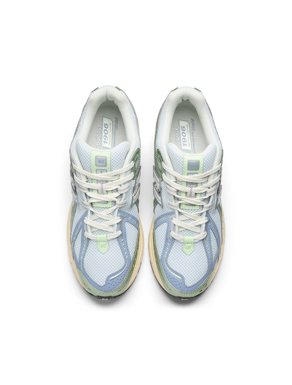 New Balance women's 1906 sneakers in metallic green, showcasing stylish athletic footwear with a shiny finish.