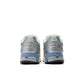 New Balance women's 1906 sneakers in metallic green, stylish athletic footwear with a sleek design and textured details.