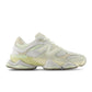New Balance men's 9060 lifestyle shoes in white and yellow with stylish design and sporty look.