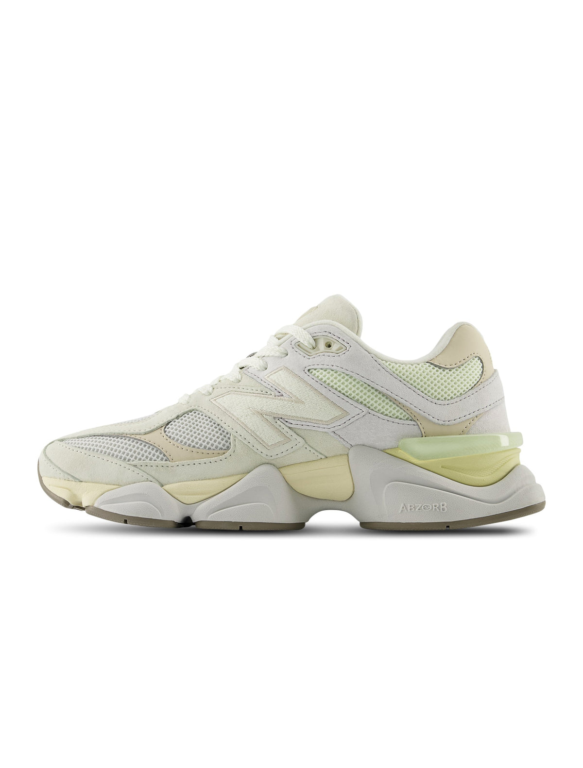 New Balance men's 9060 lifestyle shoes in white and yellow with sporty design and cushioned soles.