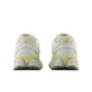 New Balance Men's 9060 Lifestyle Shoes in white and yellow, showcasing sporty design and comfortable footwear style.