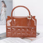 Embossed Enamel Top Handle Bag - Farnelli