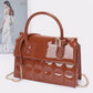 Embossed Enamel Top Handle Bag - Farnelli