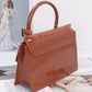 Embossed Enamel Top Handle Bag - Farnelli