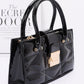 Embossed Enamel Handle Clutch - Farnelli