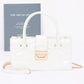 Embossed Enamel Handle Clutch - Farnelli