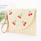 Faux Straw Cherry Clutch - Farnelli