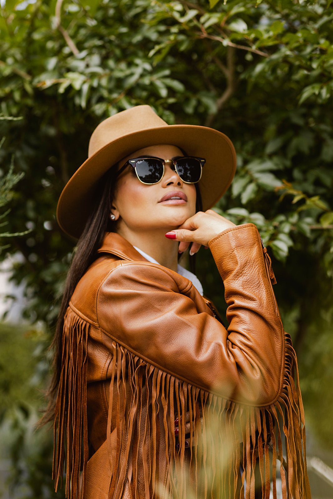 Whet Blu NYC Daisy women's fashion leather jacket in a city photoshoot setting