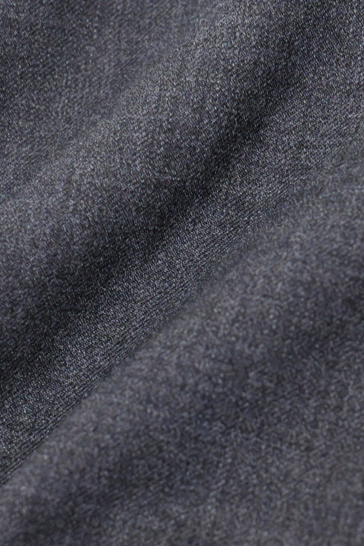 Gray hybrid wool blazer by Twillory featuring a tailored fit, classic lapel, and textured heather fabric.