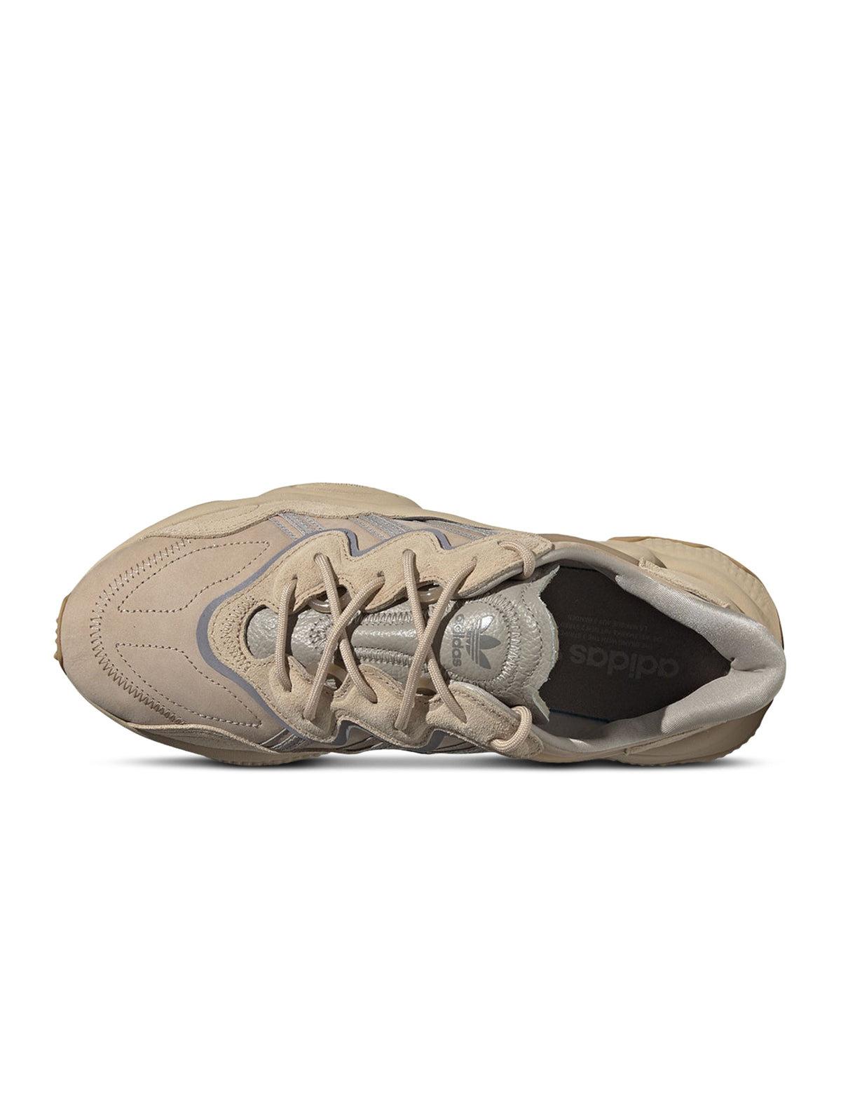 Adidas Men's Ozweego brown sneakers with white soles, stylish men's footwear, featuring a modern design and comfortable fit.