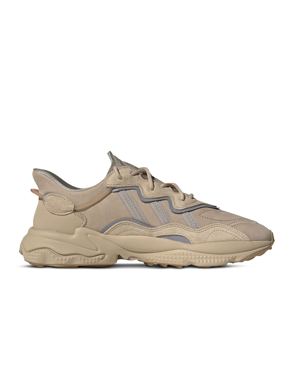 Brown Adidas Men's Ozweego sneakers with mesh and leather details, displayed on white background.