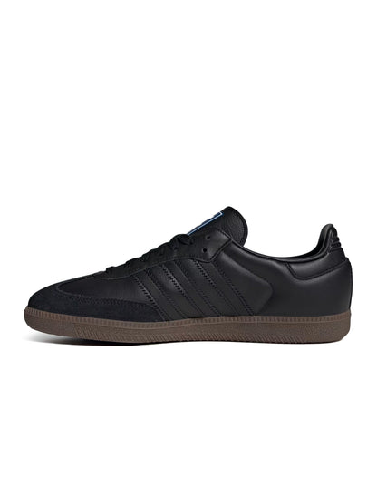 Black Adidas Men's Samba OG sneakers, side view.